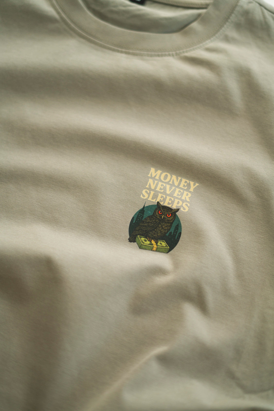 MONEY NEVER SLEEPS T-SHIRT