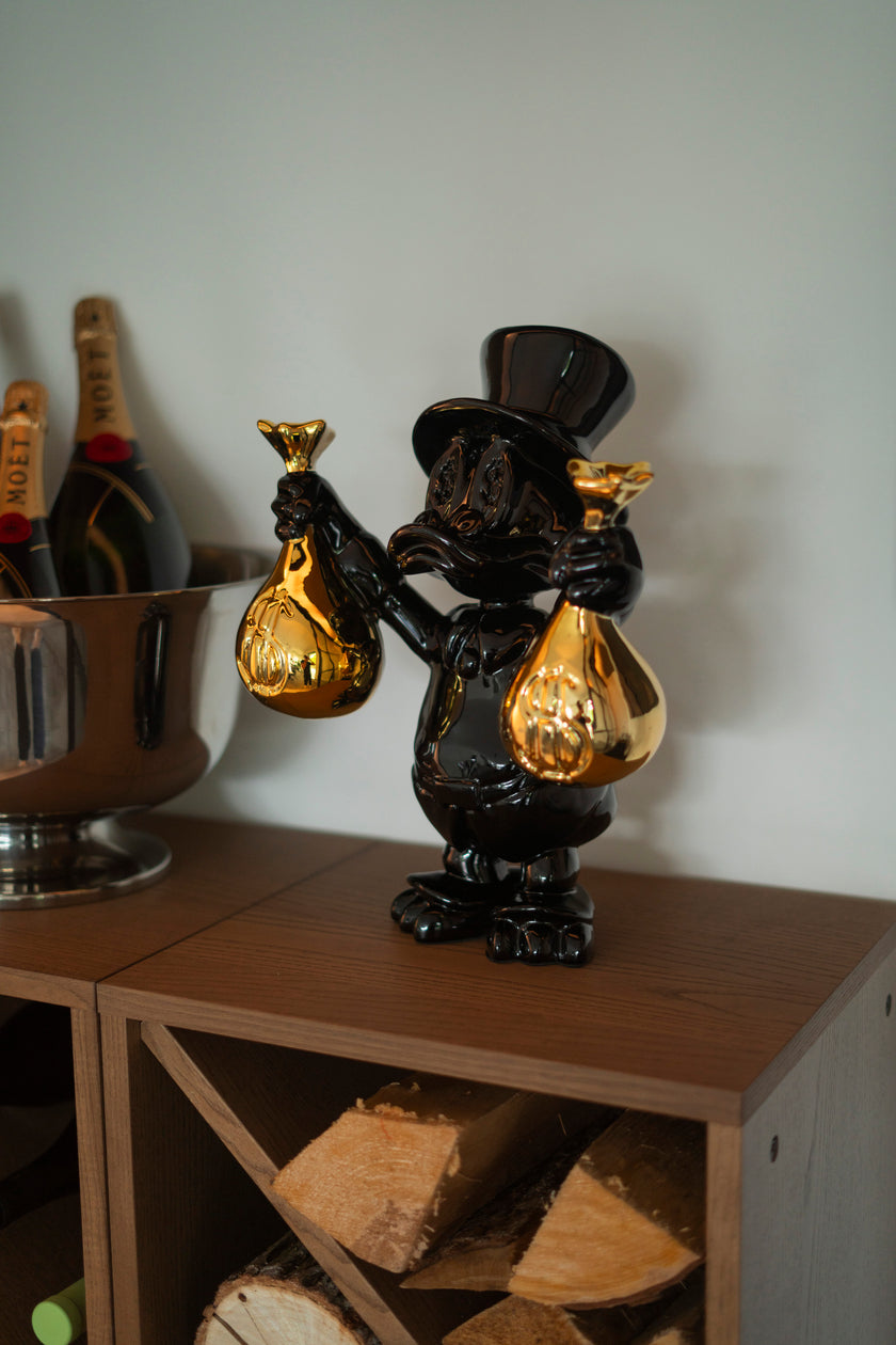 MONEYBAG DUCK BLACK/GOLD