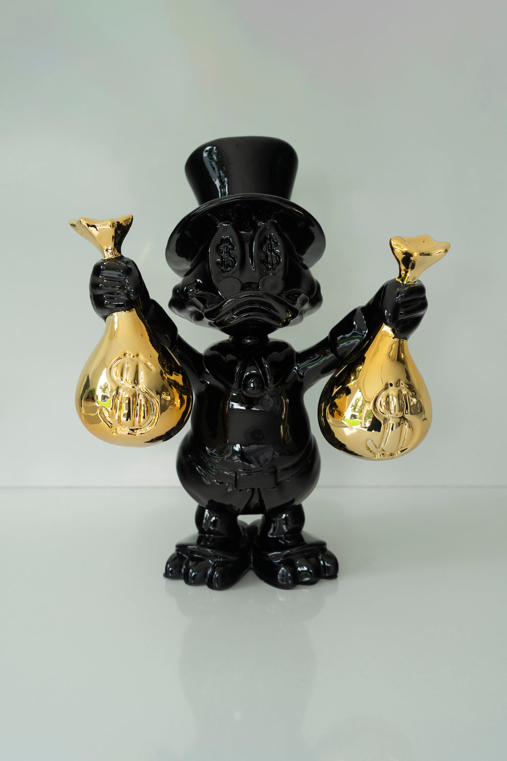 MONEYBAG DUCK BLACK/GOLD