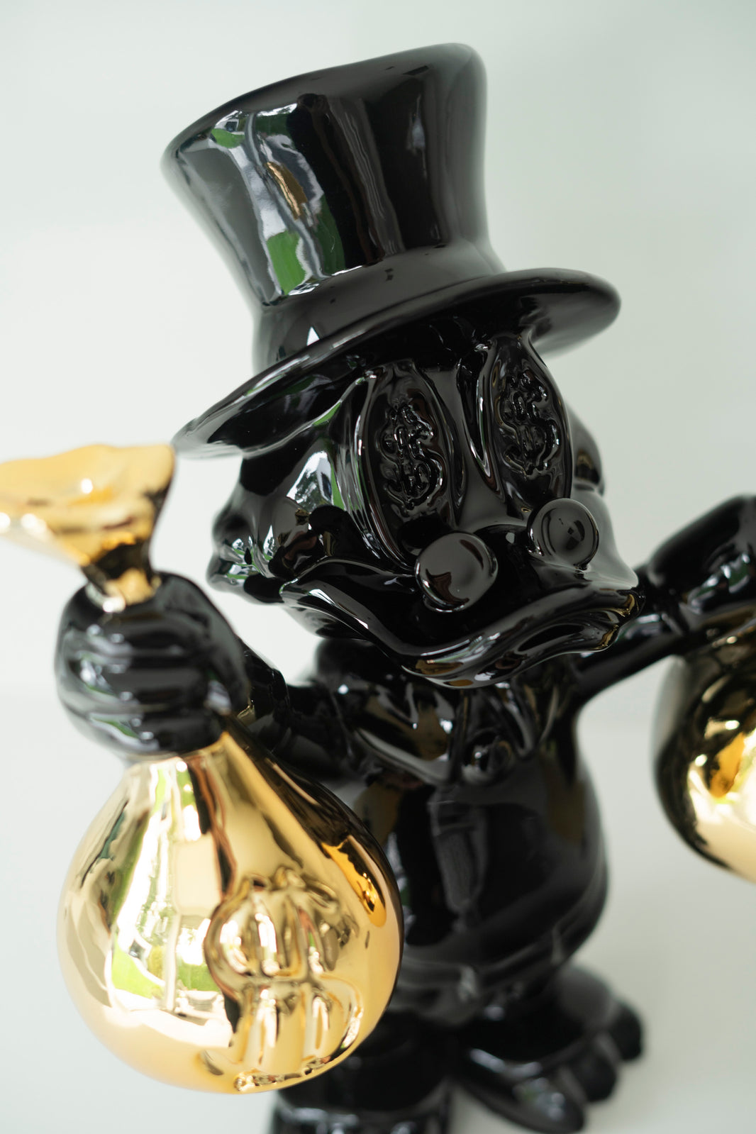 MONEYBAG DUCK BLACK/GOLD