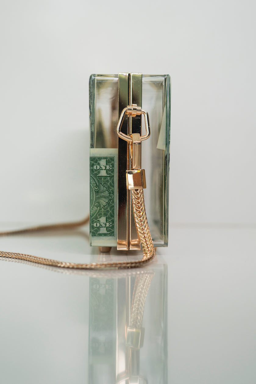 THE DOLLAR CLUTCH