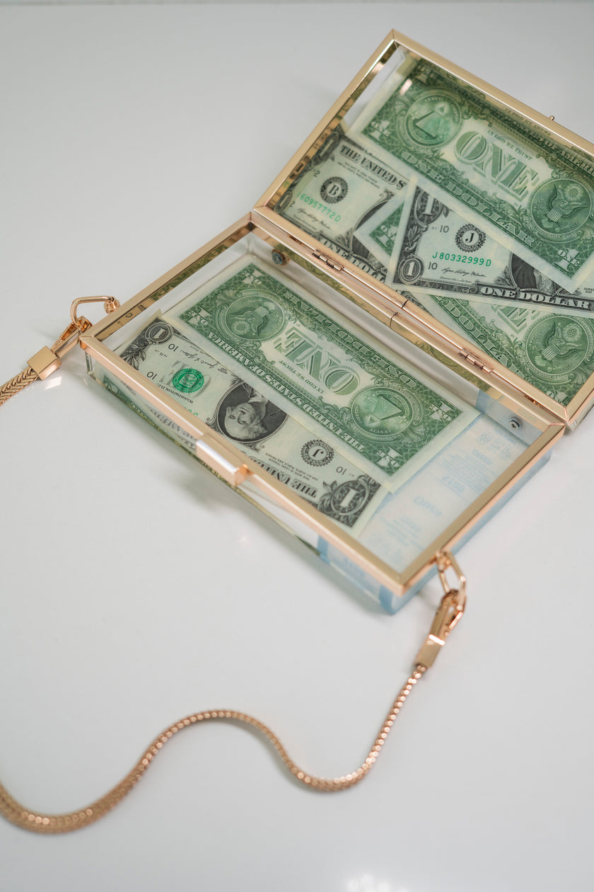THE DOLLAR CLUTCH