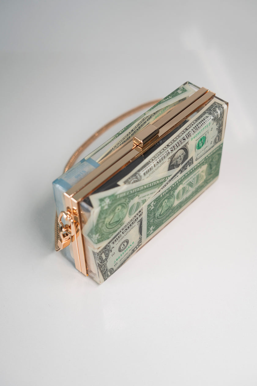 THE DOLLAR CLUTCH