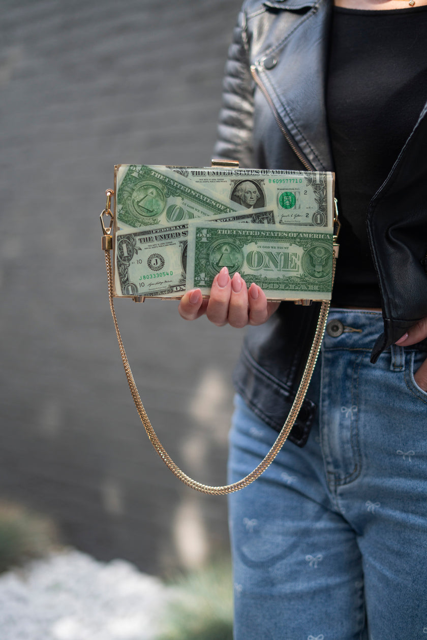 THE DOLLAR CLUTCH