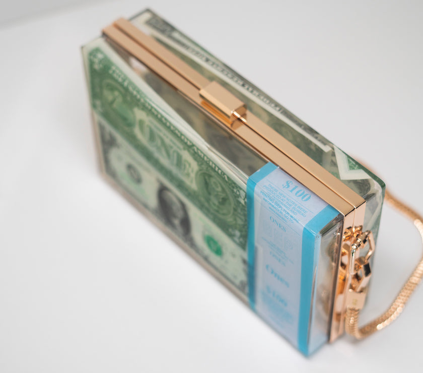THE DOLLAR CLUTCH